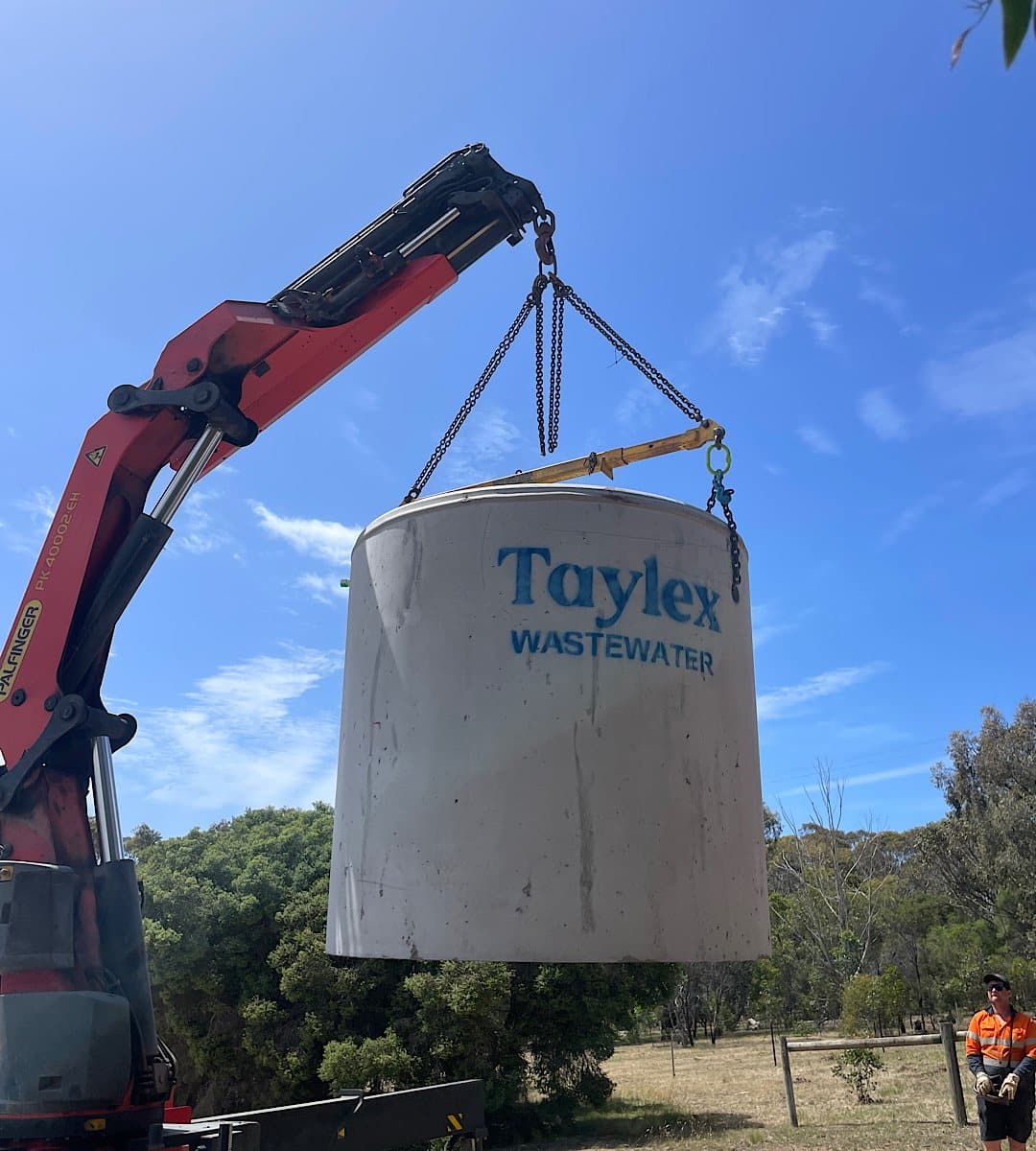Taylex Wastewater unit being crane-lifted into position — Jan Juc, Surf Coast